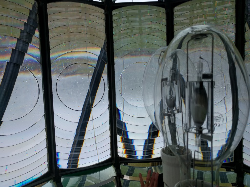 Perspective from inside a 16 sided fresnel lense, with 2 light bulbs visible