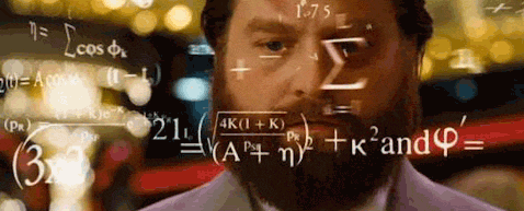 still image from "Zach Galifianakis Math" gif, with Zach looking contemplative with math notation floating in front of his face