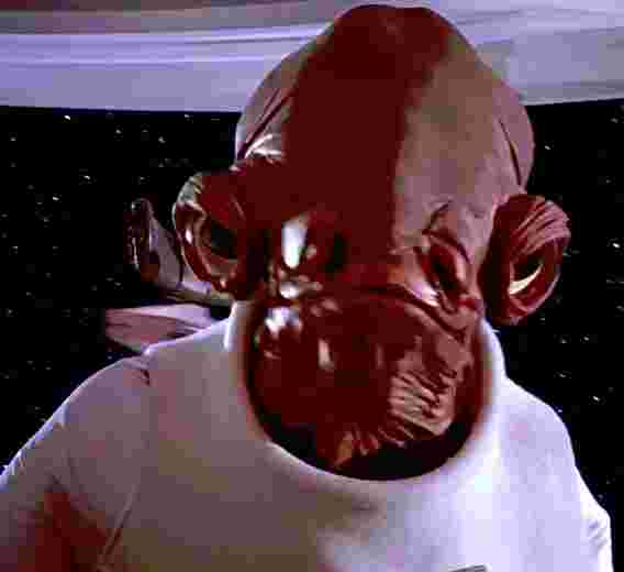 Admiral Ackbar looking at the camera, cropped. Lots of JPEG.