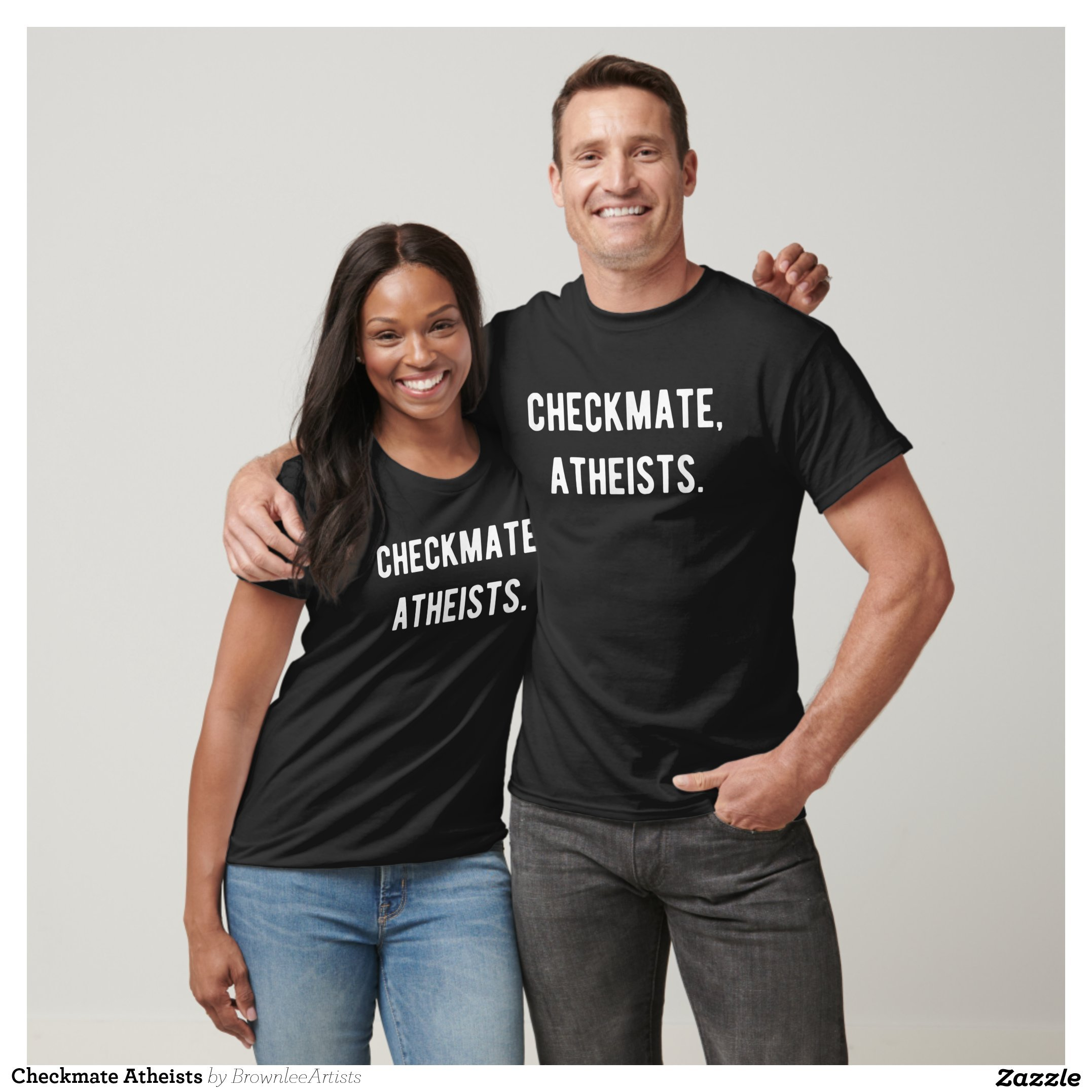 A woman and a man modelling black t shirts with CHECKMATE ATHEISTS printed on them in white. 