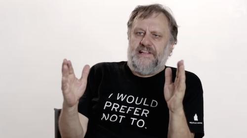 Slavoy Zizek wearing a shirt which reads "I would prefer not to"